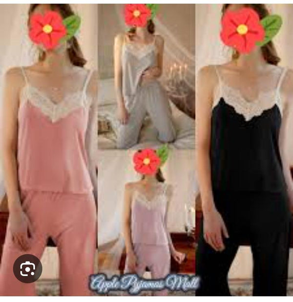 women's pajama or loungewear set in a solid gray color. The ensemble consists of two main pieces: