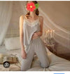 women's pajama or loungewear set in a solid gray color. The ensemble consists of two main pieces: