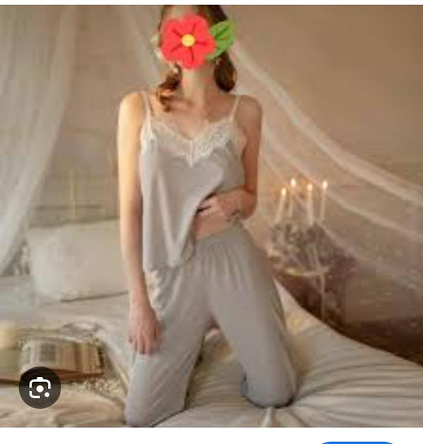 women's pajama or loungewear set in a solid gray color. The ensemble consists of two main pieces: