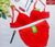Red cotton bra and panty set, often marketed for bridal use or everyday comfort in Pakistan. The set features a plain, non-padded or lightly padded bra paired with matching full-coverage cotton briefs.